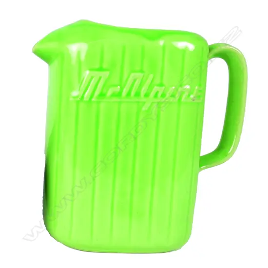 A vintage Crown Lynn green McAlpine fridge jug