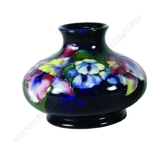 A Walter Moorcroft squat baluster orchid pattern vase