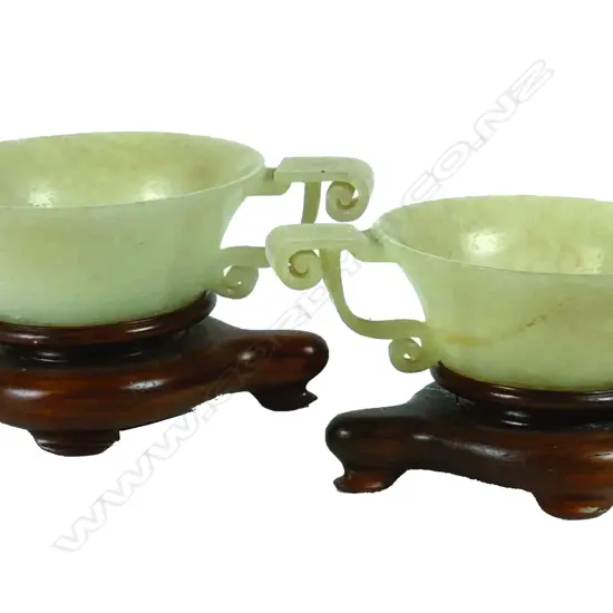A pair of small Chinese jade bowls