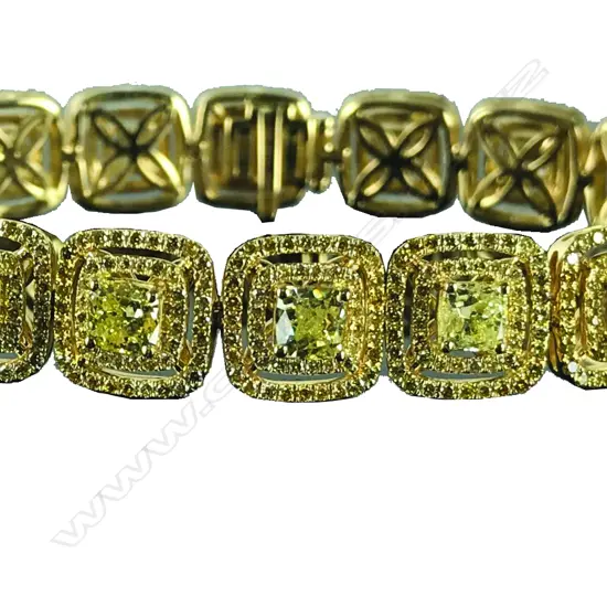 An impressive fancy yellow multi-diamond and 18ct. yellow gold bracelet