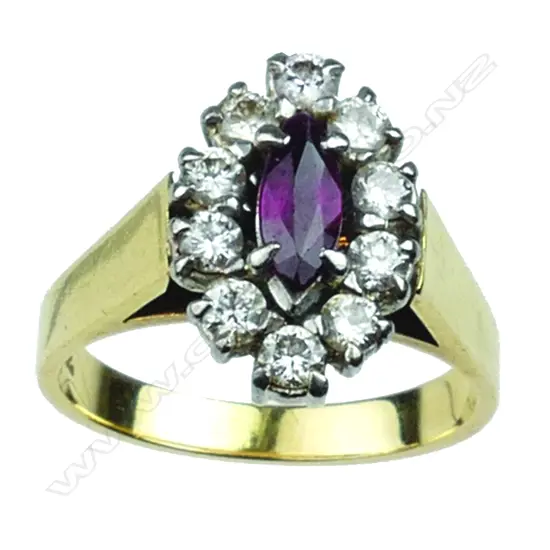 A vintage lady's 18ct. ruby and diamond cluster ring