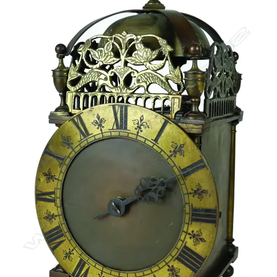 An early brass cased lantern clock