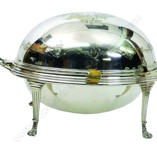 A silver plated bacon serving dish by Thomas Bradbury & Sons