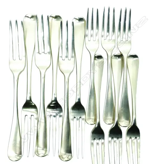 A set of six plus six William IV silver three pronged forks