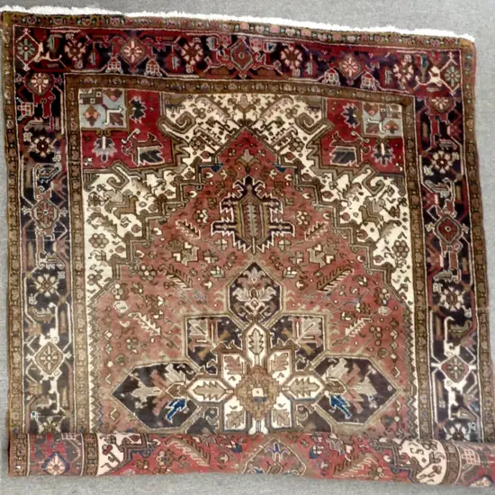 A hand knotted Turkish Heriz carpet