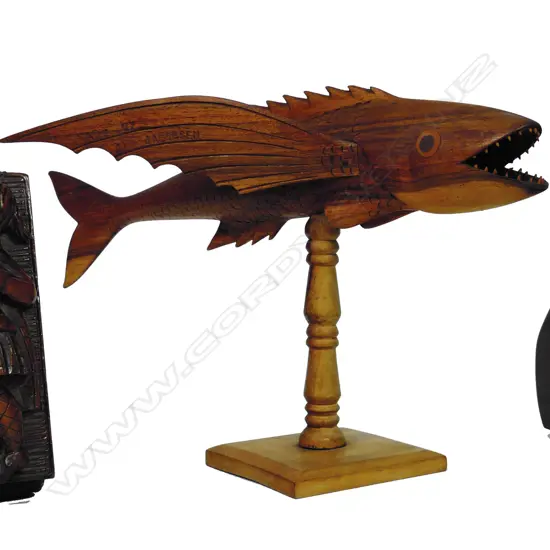 A carved wood Pitcairn Island flying fish sculpture