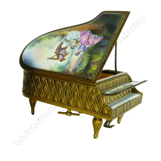 A brass and enamel jewellery box