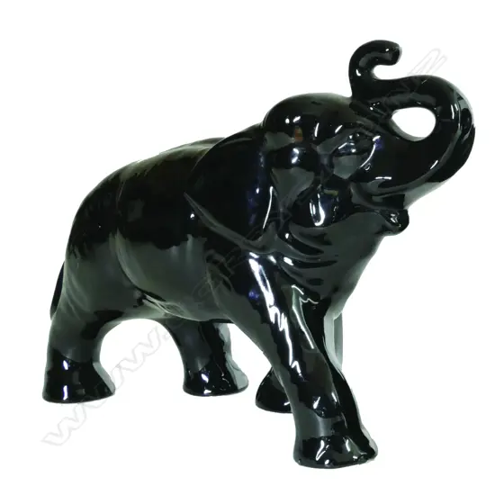 A Crown Lynn black glazed elephant