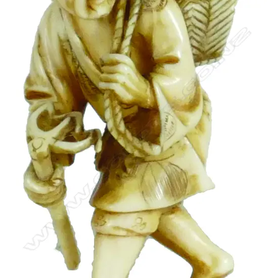 A Japanese ivory okimono