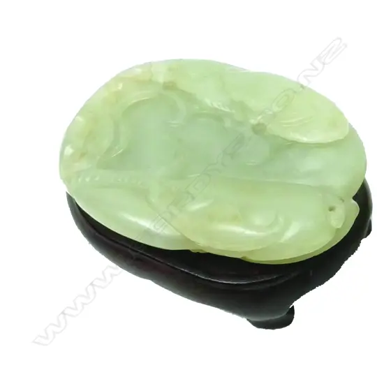 A good Chinese pale green jade carving of multiple fruits