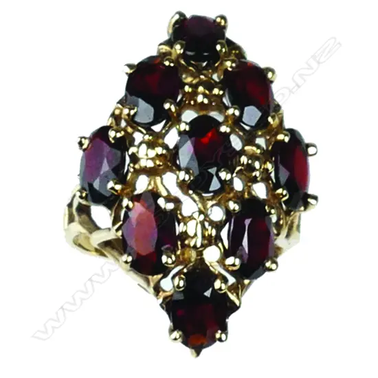 A vintage 10ct. yellow gold and garnet cluster princess type ring