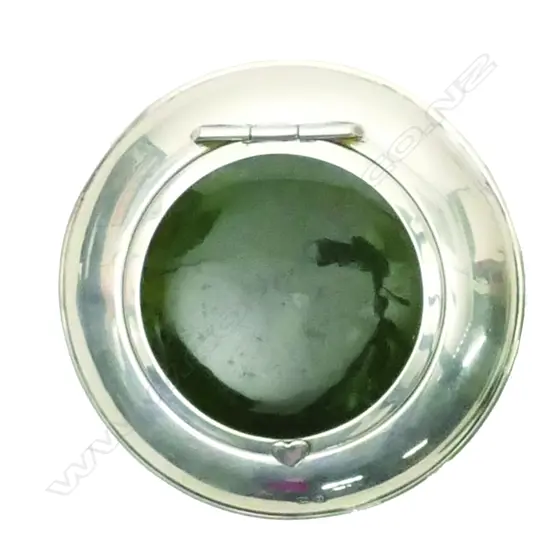 A 1920s silver and greenstone panelled tobacco box