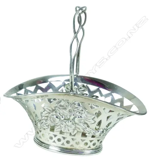 An Edwardian silver basket shaped bonbon dish
