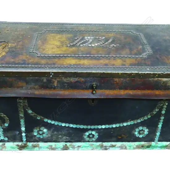 A 19thC leather bound and brass mounted highly decorative travelling trunk