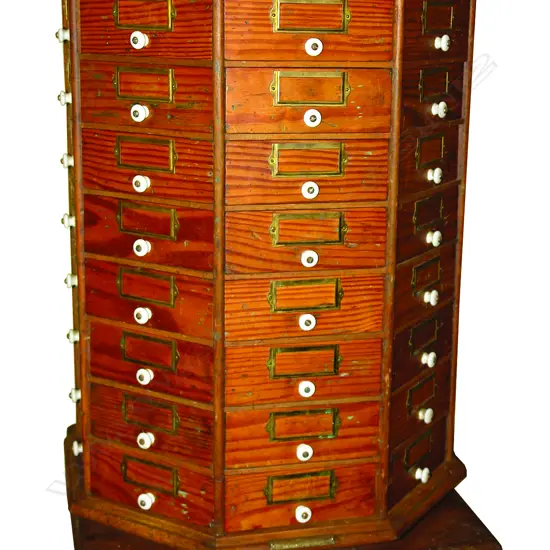 A c.1900 'The American Bolt & Screw Case Co.' revolving hardware chest/cabinet