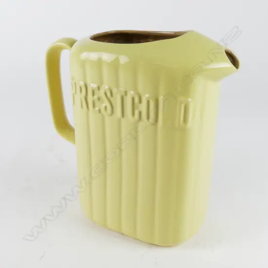 An uncommon Crown Lynn lemon yellow refrigerator jug