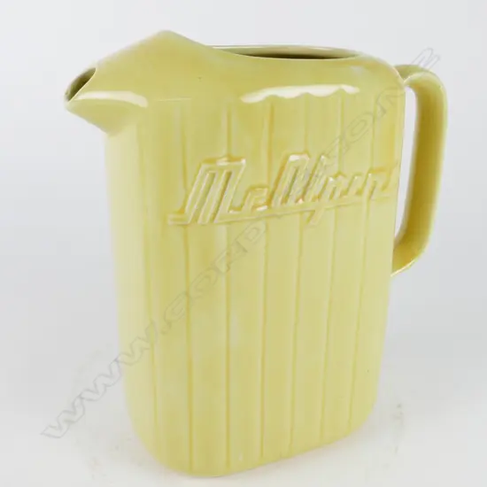 A vintage Crown Lynn lemon yellow McAlpine refrigerator jug