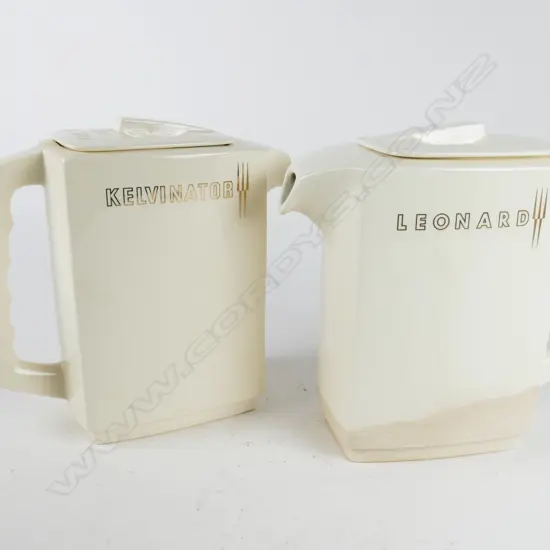 Two Crown Lynn white lidded refrigerator jugs