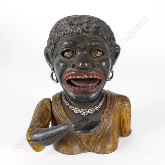 An old Dinah cast-iron mechanical bank