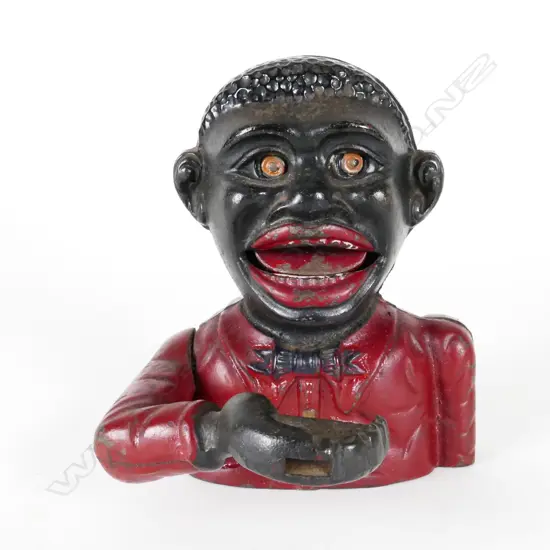 An old Little Joe cast iron mechanical bank