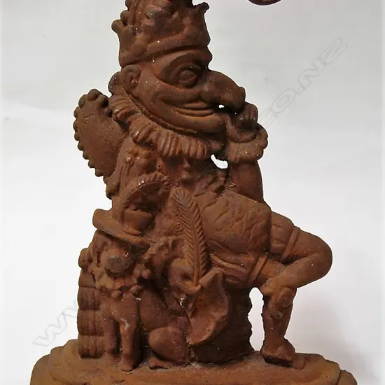 A cast iron 'Punch' door stop