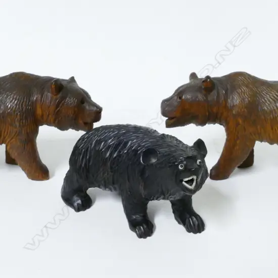 Three miniature carved wood standing bears