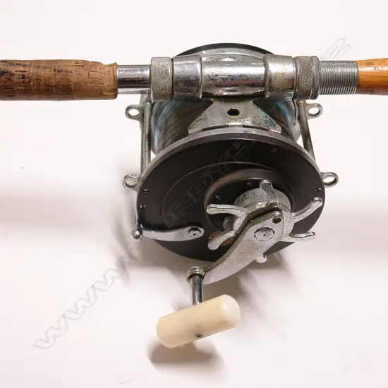 A large vintage 'Ocean City' big game fishing reel and matching rod