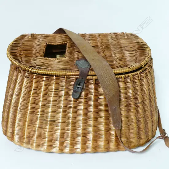 A wicker fishing creel