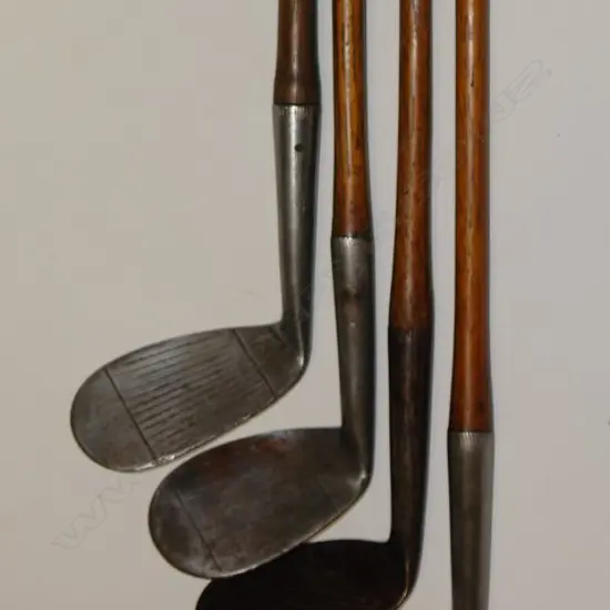 Four vintage hickory shafted golf clubs