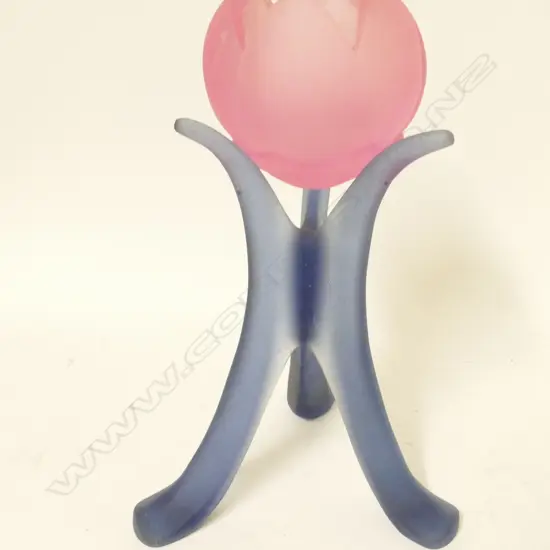 A Ron Reichs cast glass lotus flower on triform stand