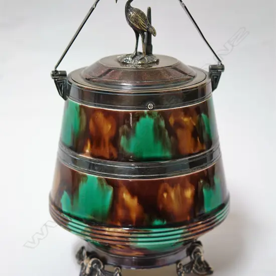 A Victorian majolica and silver plate mounted Aesthetic Movement lidded biscuit barrel