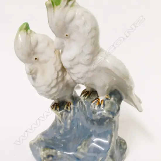 A Doulton Lambeth stoneware bird group