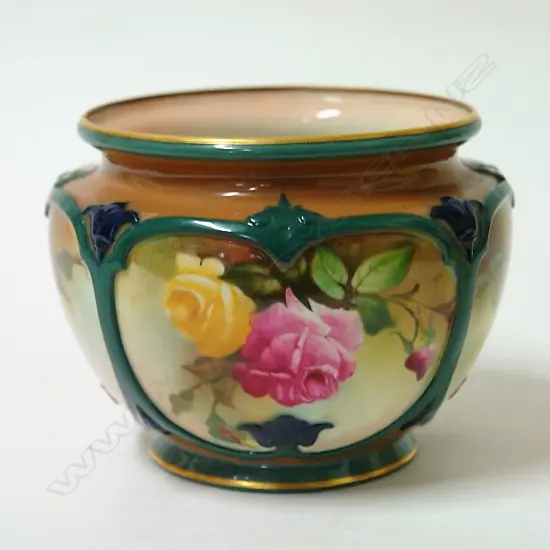 An early 20thC Royal Worcester hand painted 'Roses' vase