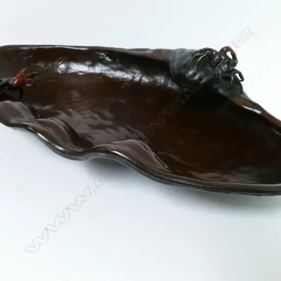 An old bronze shell shaped dish