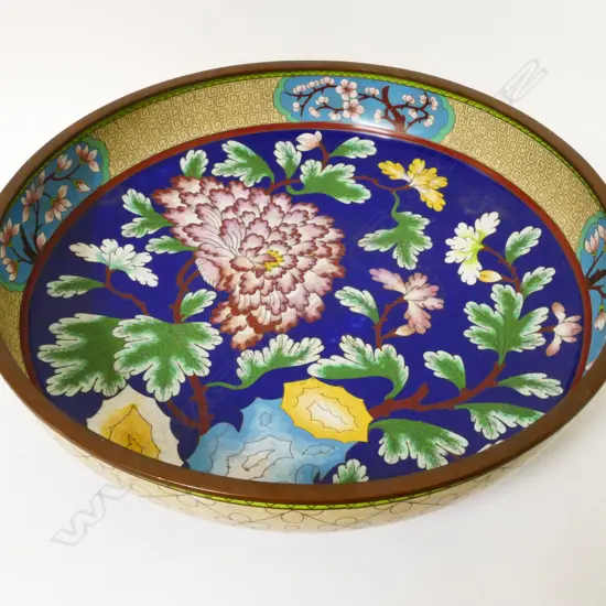 A large Chinese cloisonné circular dish on low foot