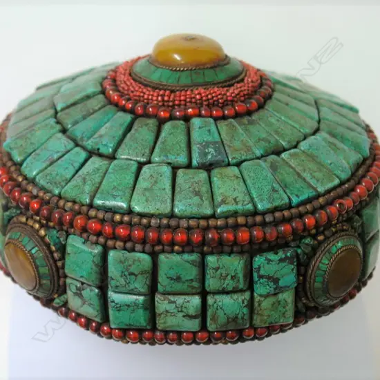 An old Tibetan priest's jewelled hat