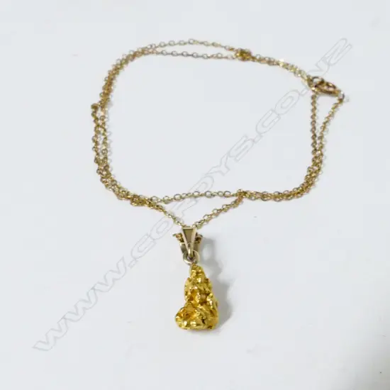 A small gold nugget pendant