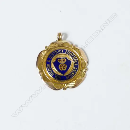 A 9ct. gold football medallion