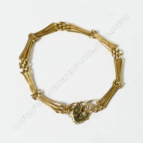 A 9ct. gold gate bracelet