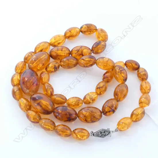 A vintage amber type molded graduated bead necklace