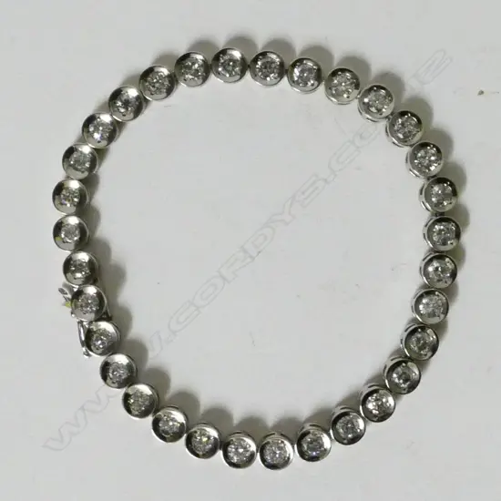 A lady's platinum and diamond tennis bracelet