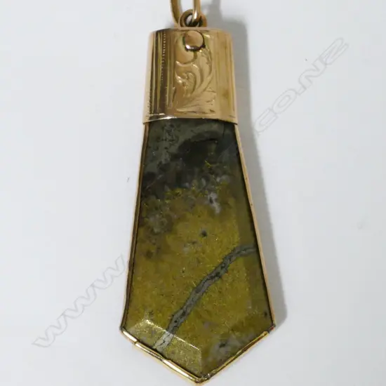 A colonial 9ct. rose gold and goldstone pendant