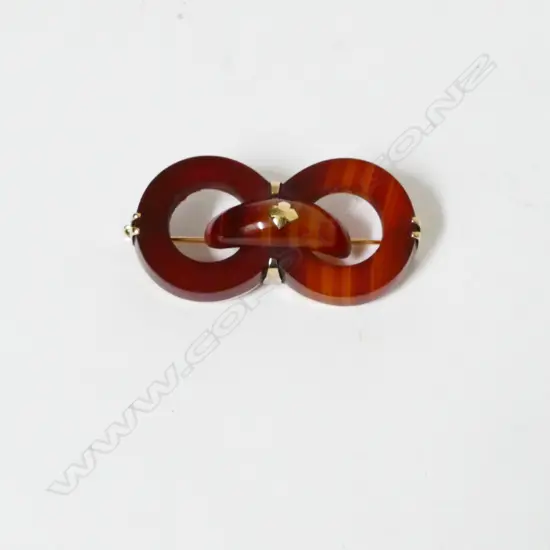 A Victorian Scottish carnelian and gold brooch