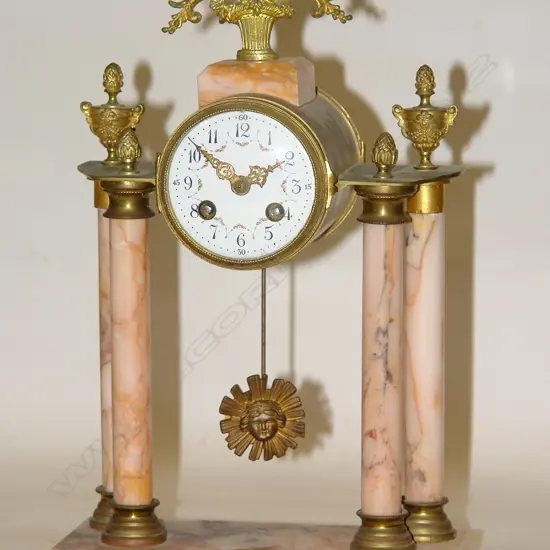 A 19thC French ormolu and marble portico clock