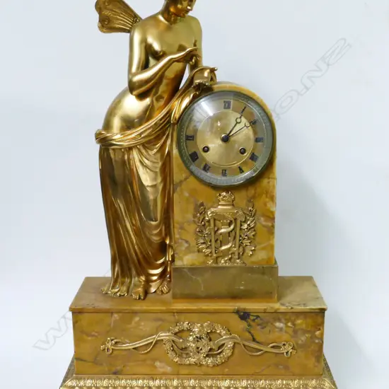 A late 19thC French ormolu and marble nymph-figured mantel clock
