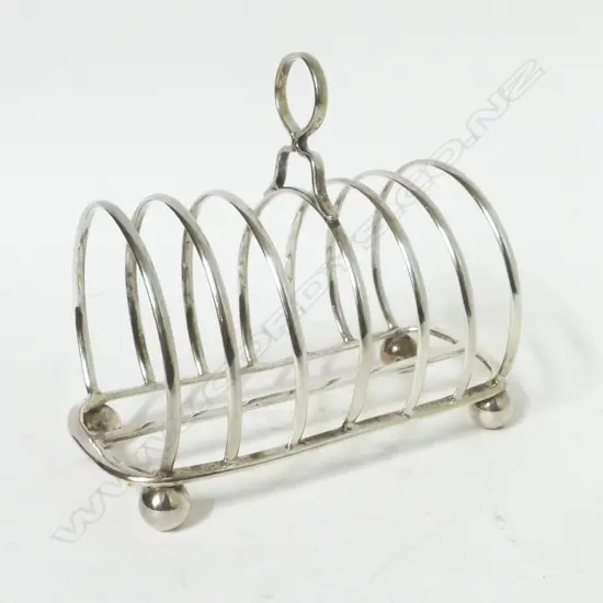 A Victorian silver seven bar toast rack