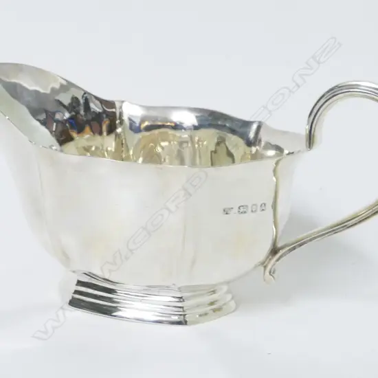 A silver sauce boat