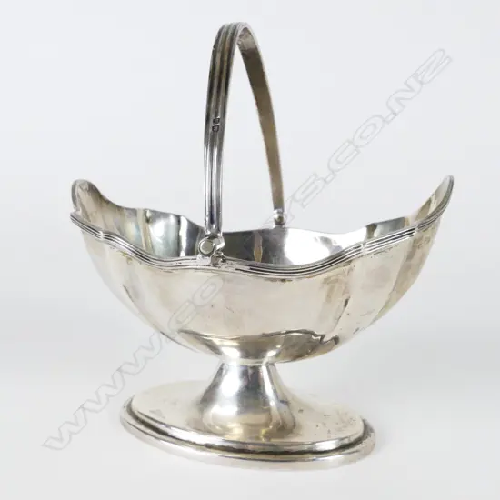 A Victorian silver sugar basket