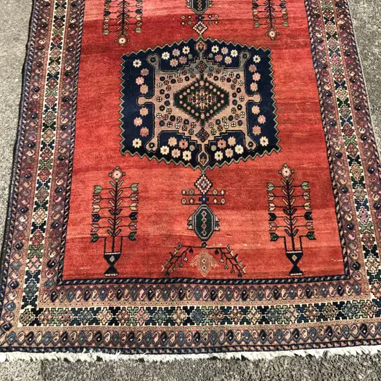 A handknotted Iranian carpet