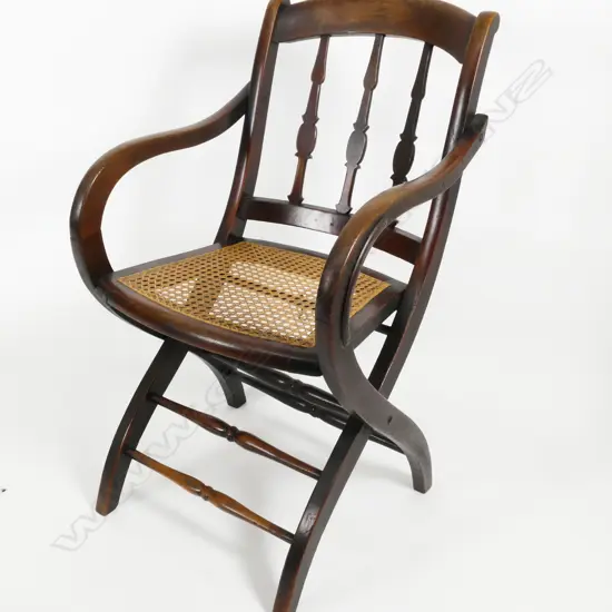 A 19thC Nicholas Gollingnon walnut campaign chair
